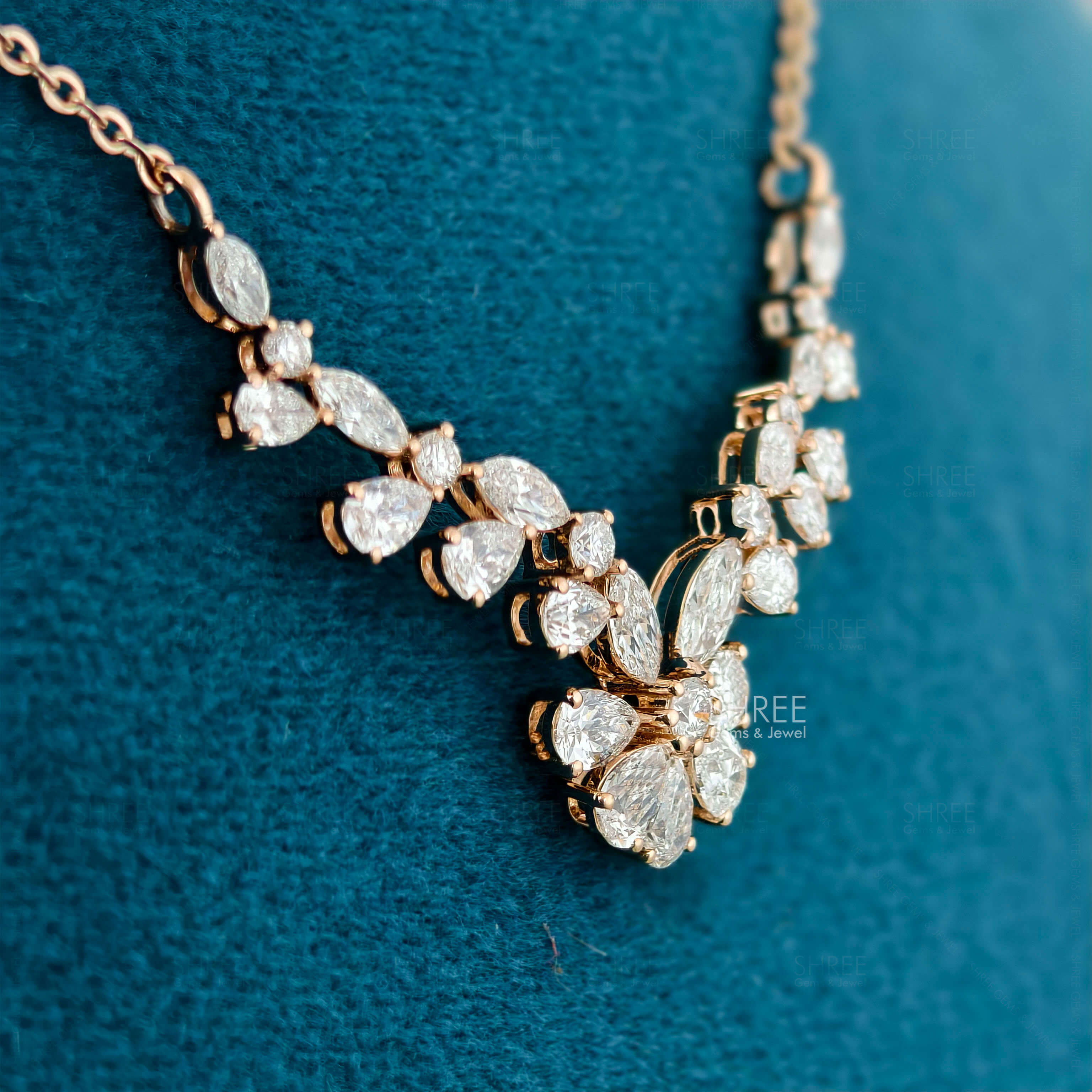 side view of floral diamond necklace​
