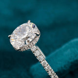 Closeup shot of Oval Cut Diamond Hidden Halo Engagement Ring