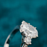 Close Up View of Oval-Cut Diamond Three Stone Engagement Ring