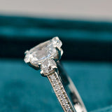 Side View of Oval Cut Diamond Three Stone Engagement Ring