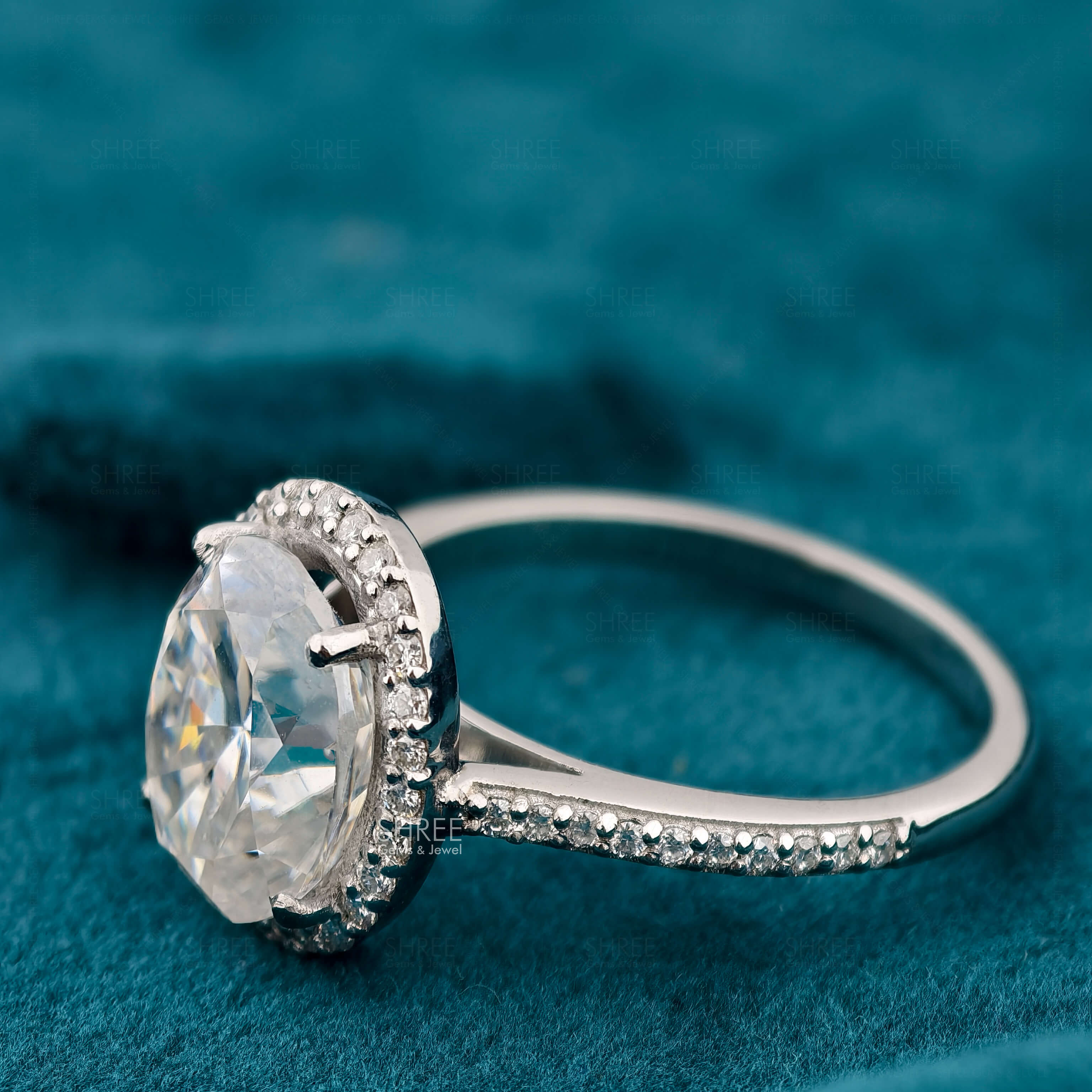 Side View of Oval Diamond Halo Engagement Ring