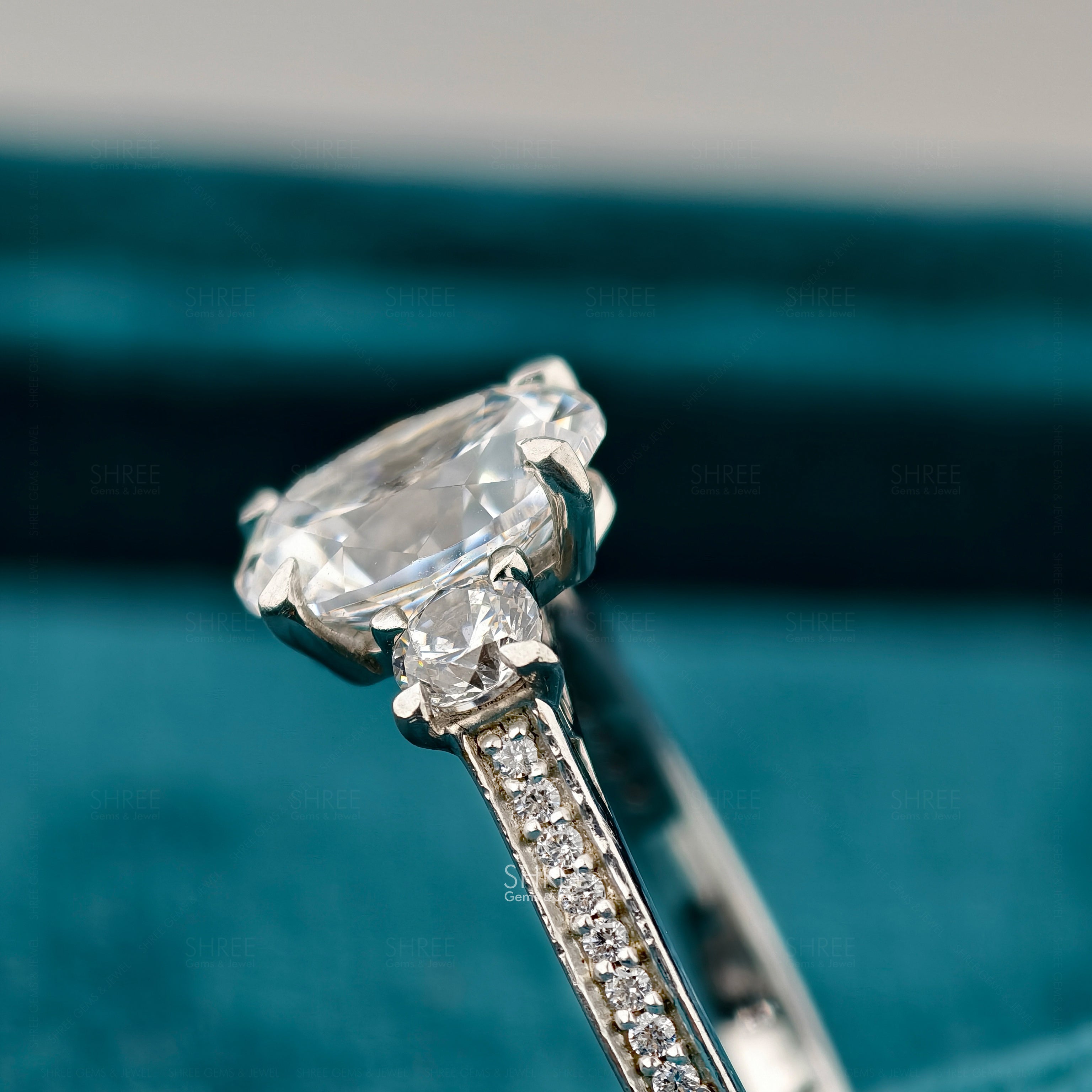 Oval And Round Cut Diamond Engagement Rings