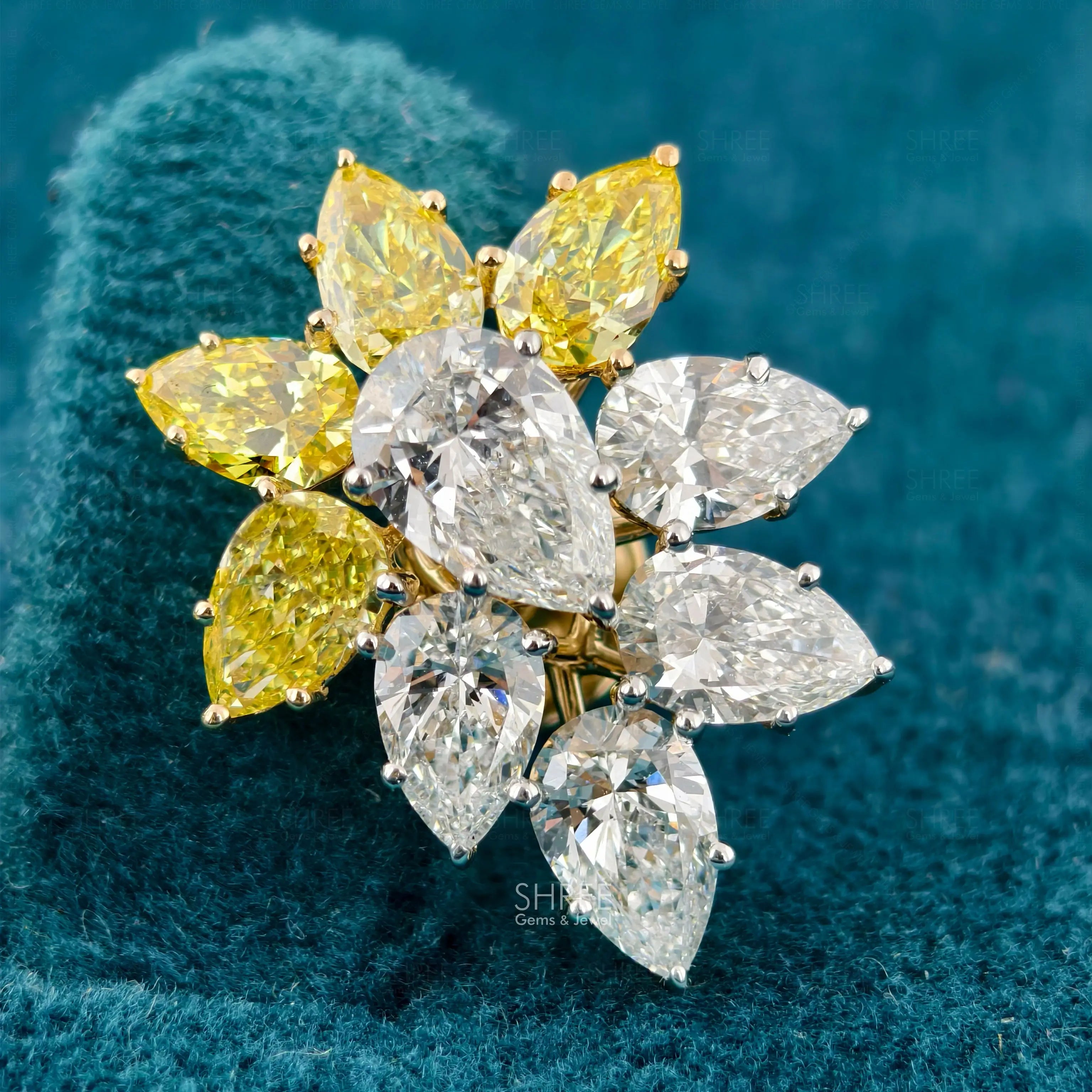 zoom view of women's yellow diamond earrings​
