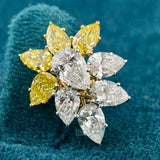 zoom view of women's yellow diamond earrings​
