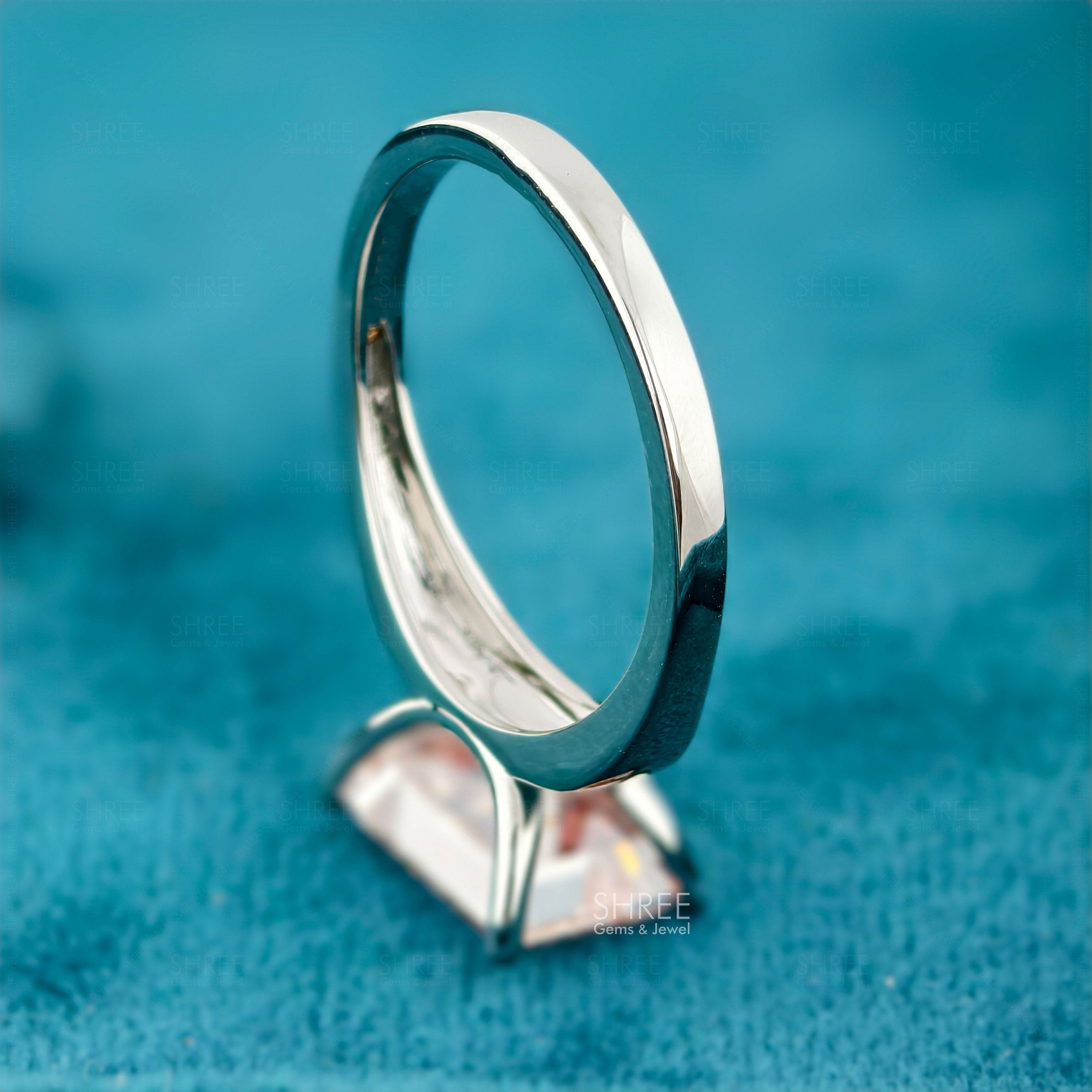 bottom view of emerald cut 4 carat diamond ring​