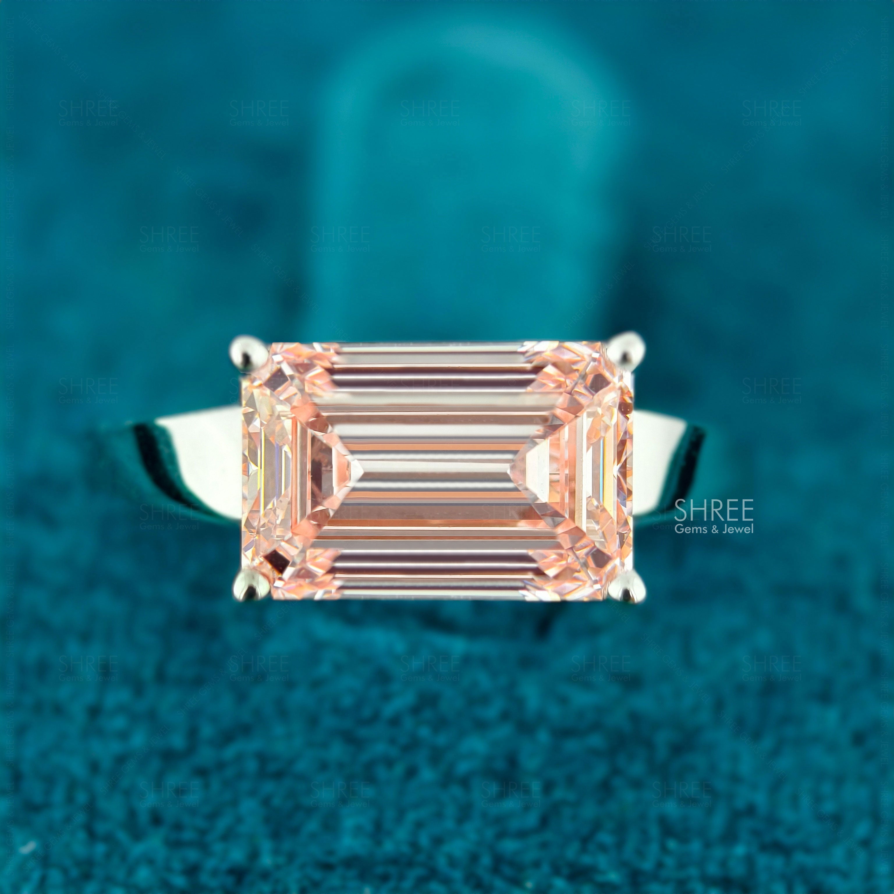 front view of 4 carat emerald cut diamond ring