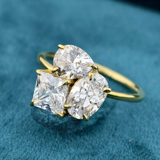 Front View of Princess, Oval and Pear Cut Three Stone Toi Et Moi Ring