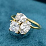 Front View of Princess, Oval and Pear Cut Three Stone Toi Et Moi Ring