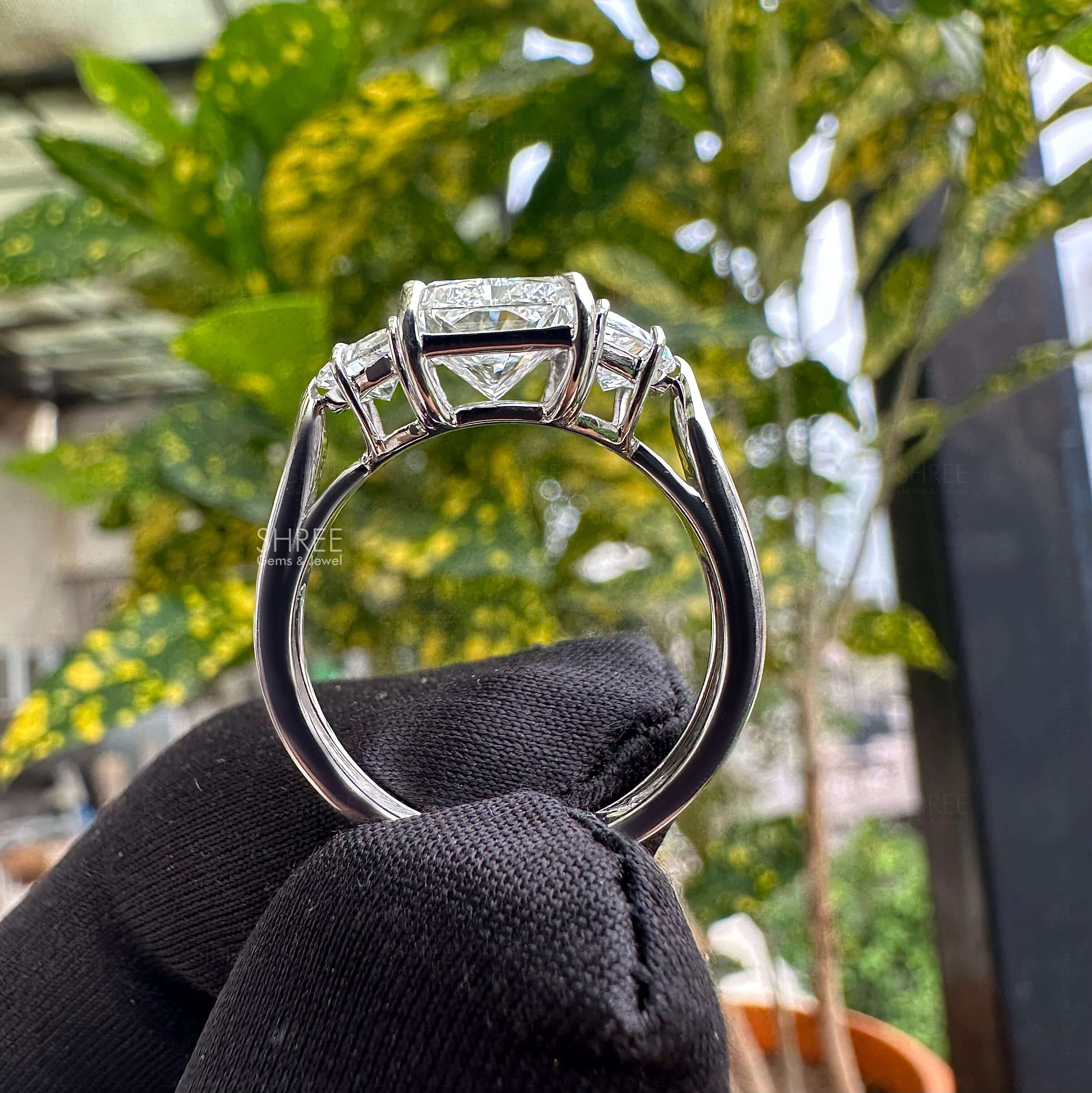 Full band view of Radiant Cut Three Stone Engagement Ring​