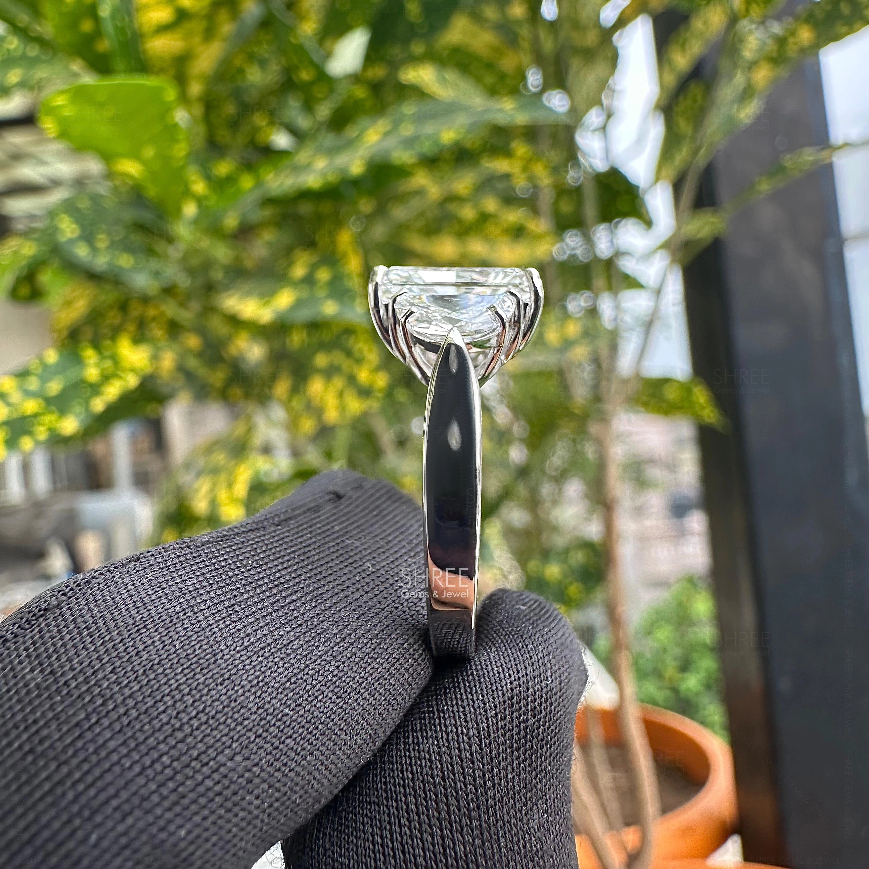 Side view of Radiant Cut Three Stone Engagement Ring​
