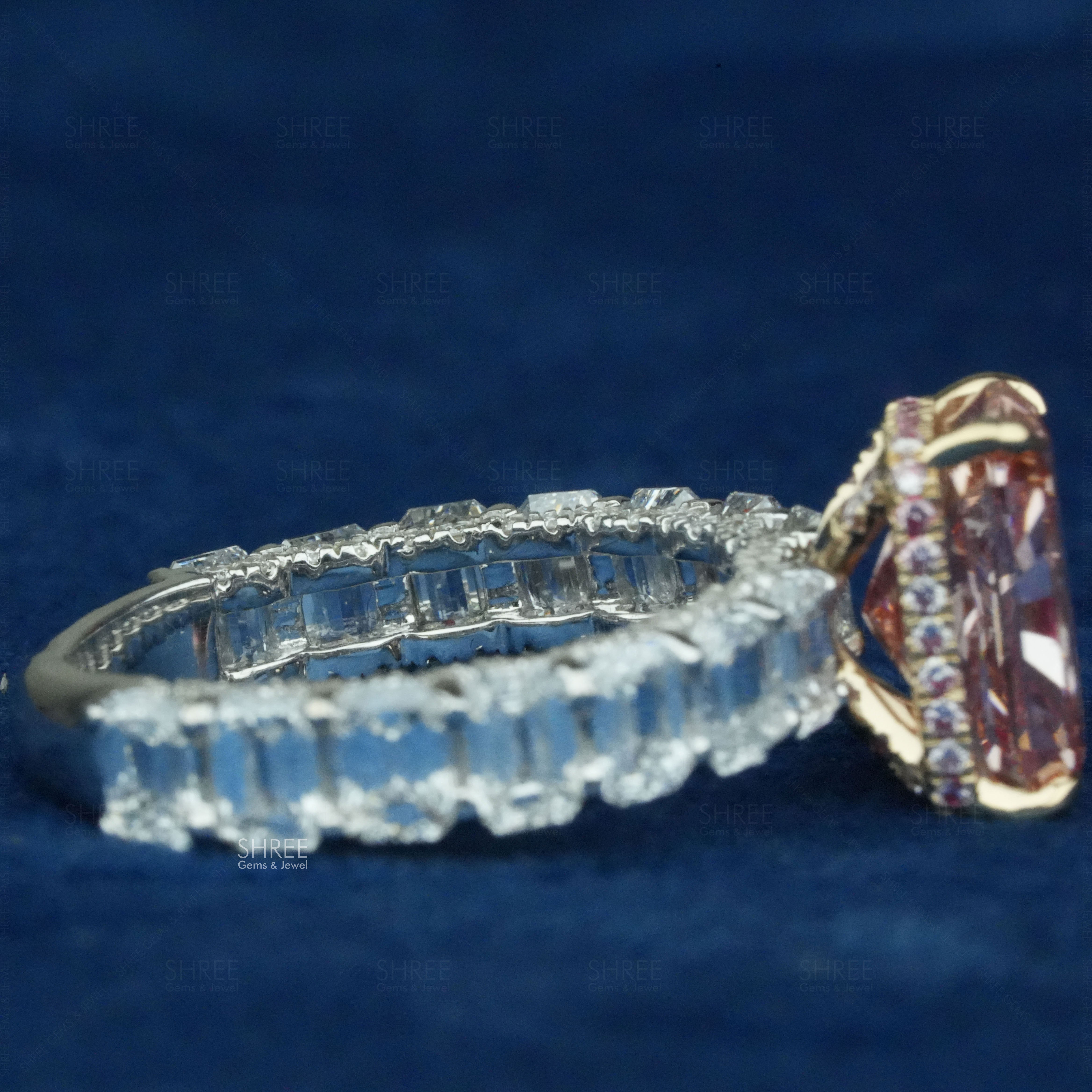 side view of women's pink diamond ring​