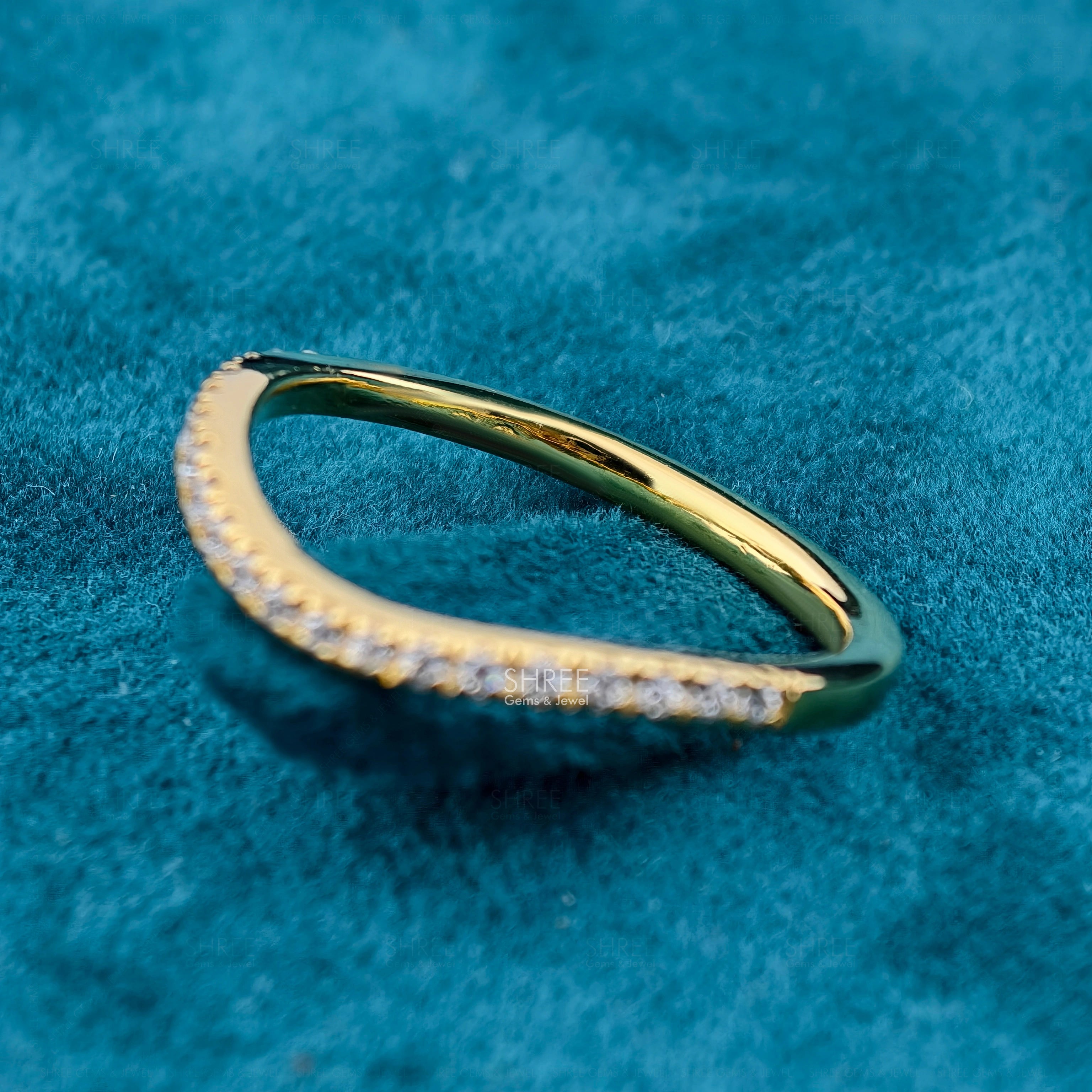 metal view of curved wedding bands for women​