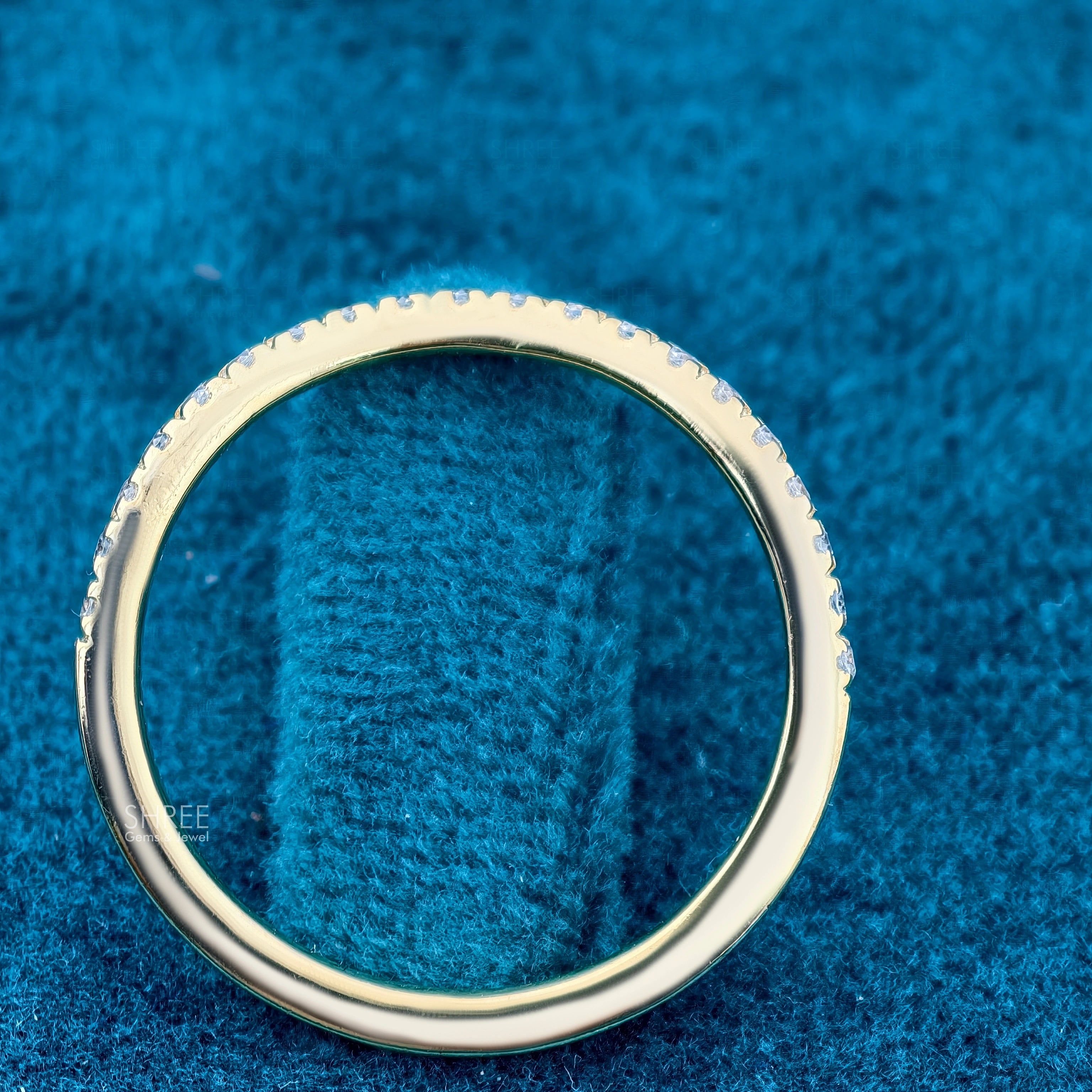 top view of round brilliant wedding band​