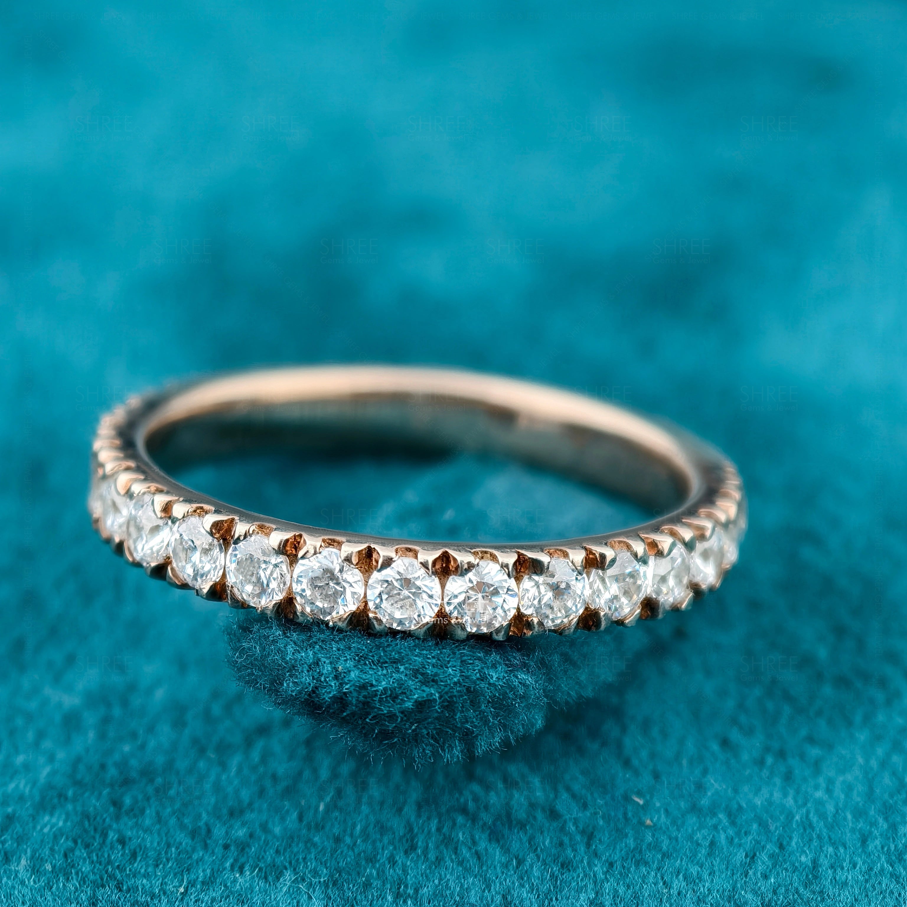 Front view of round diamond half eternity band​

