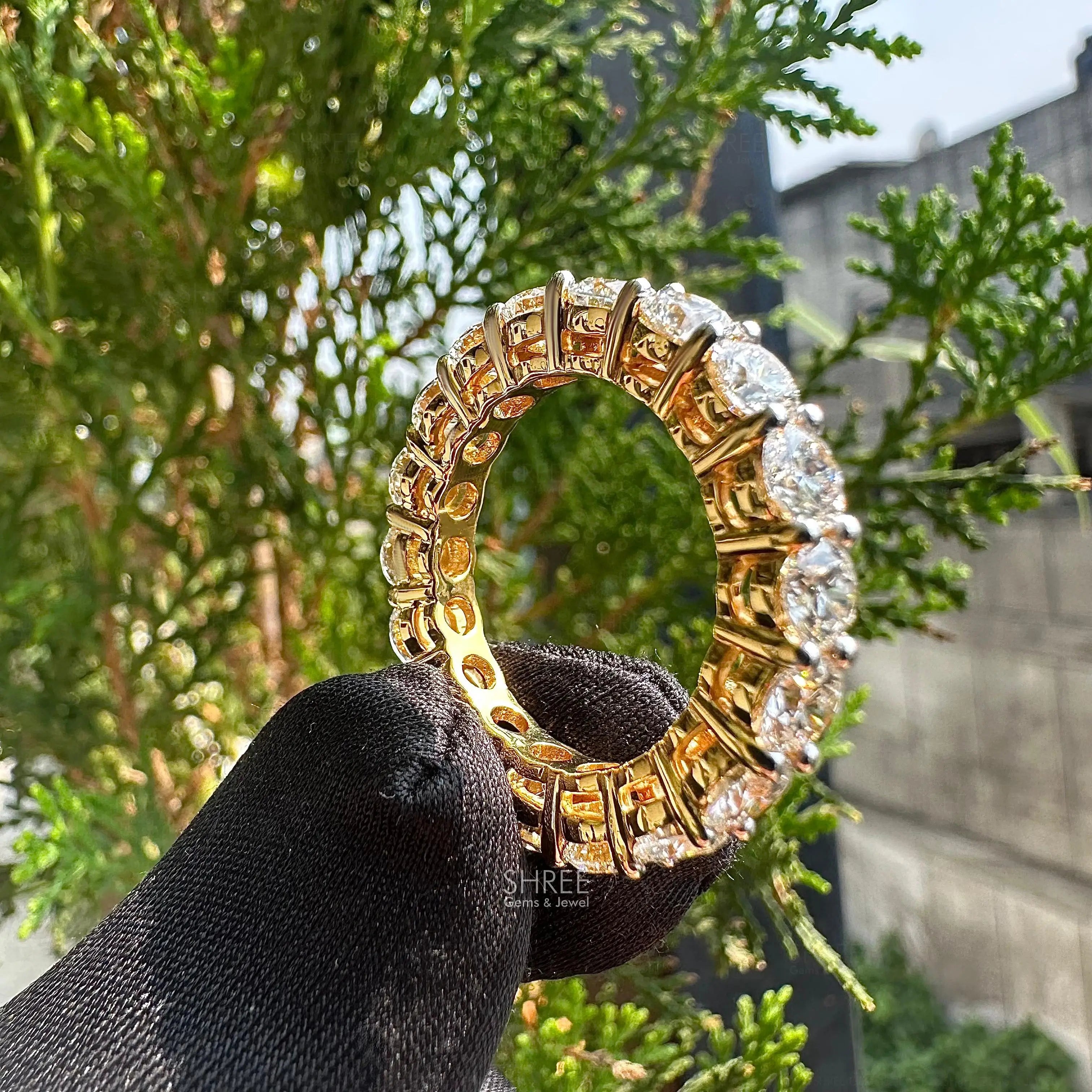 side view of round diamond band​
