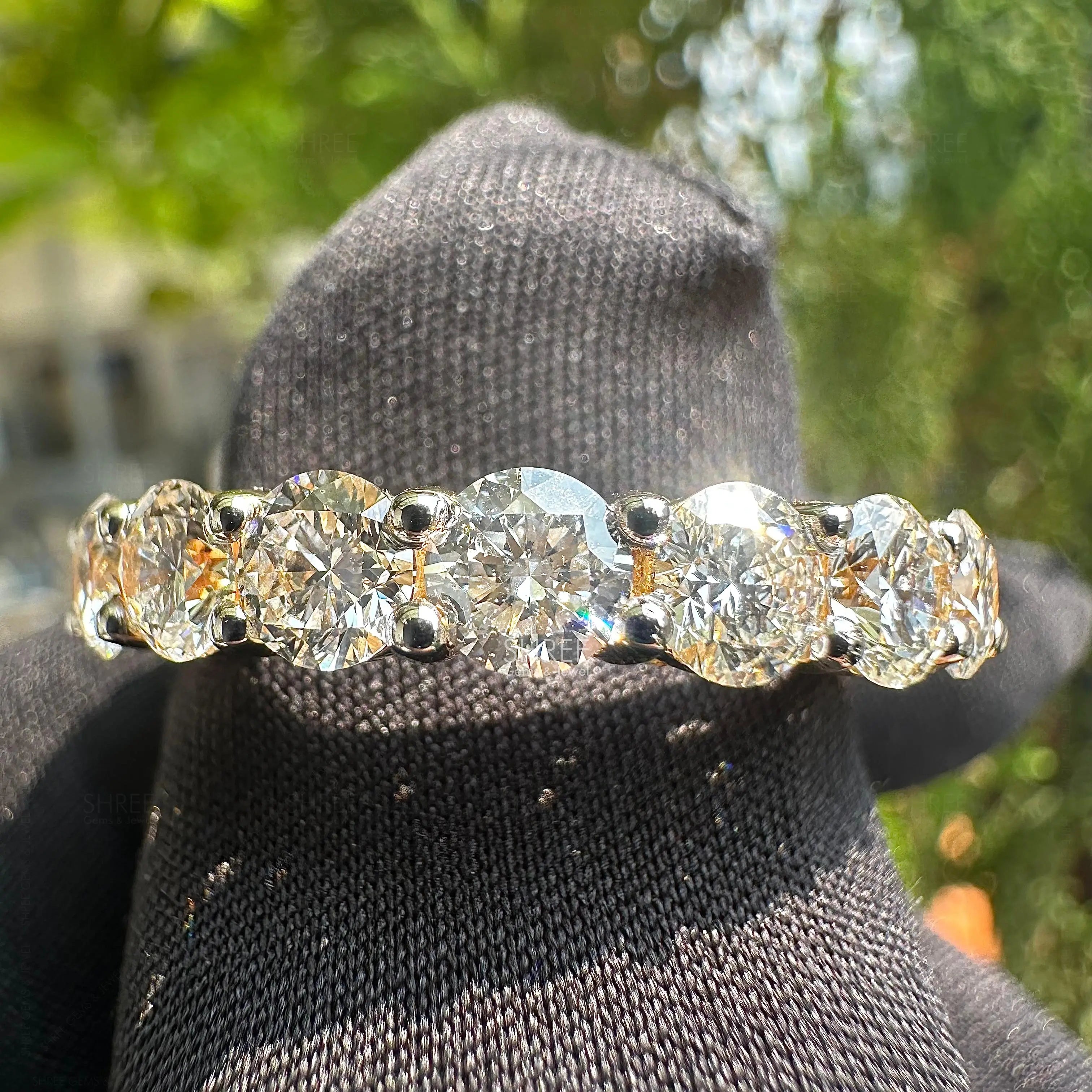front view of round diamond wedding band​
