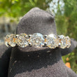 front view of round diamond wedding band​
