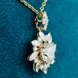 side view of floral diamond pendant​
