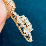 side view of flower cluster diamond pendant​

