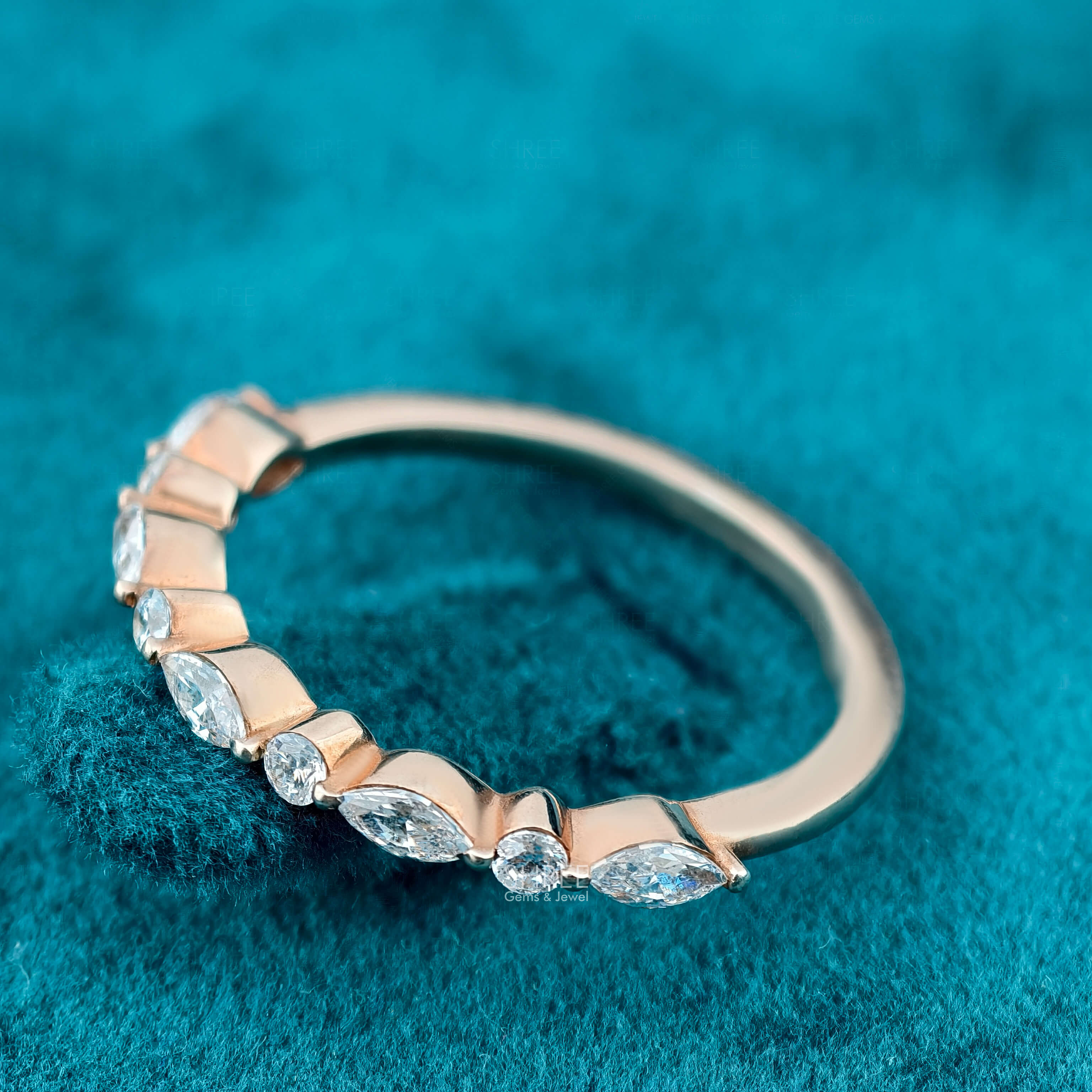 Side View of Round and Marquise Diamond Half Eternity Band