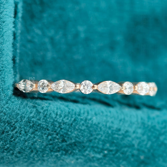 Front view of round and marquise half diamond eternity band​

