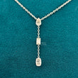 front view of diamond necklace three stone​