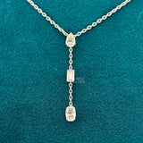 front view of diamond necklace three stone​