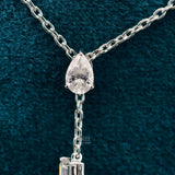 front view of three stone diamond pendant necklace​