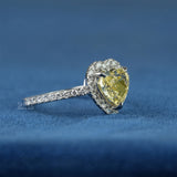side view of heart shaped diamond ring with halo​
