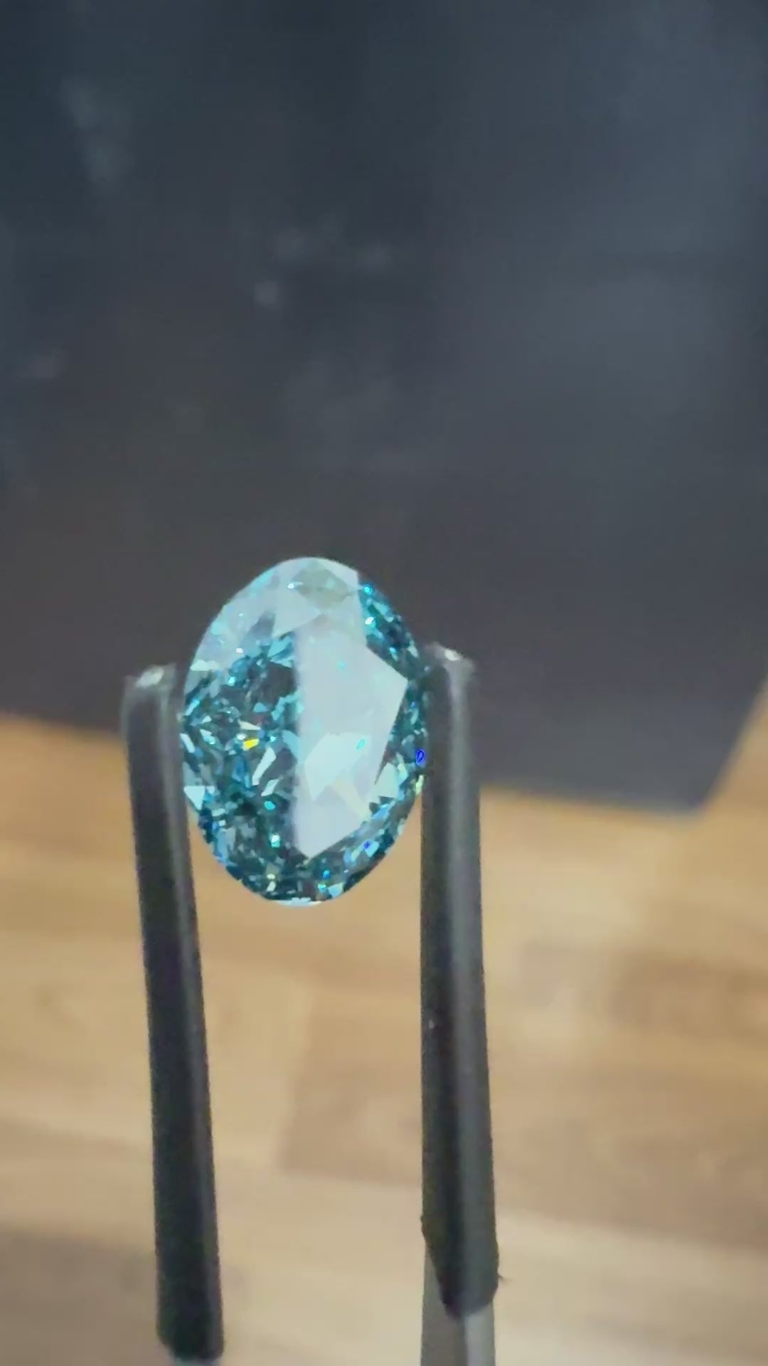 video of 1 ct blue color oval lab grown diamond​