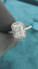 Video of 1 Carat Radiant Diamond Halo Engagement Ring with Accent