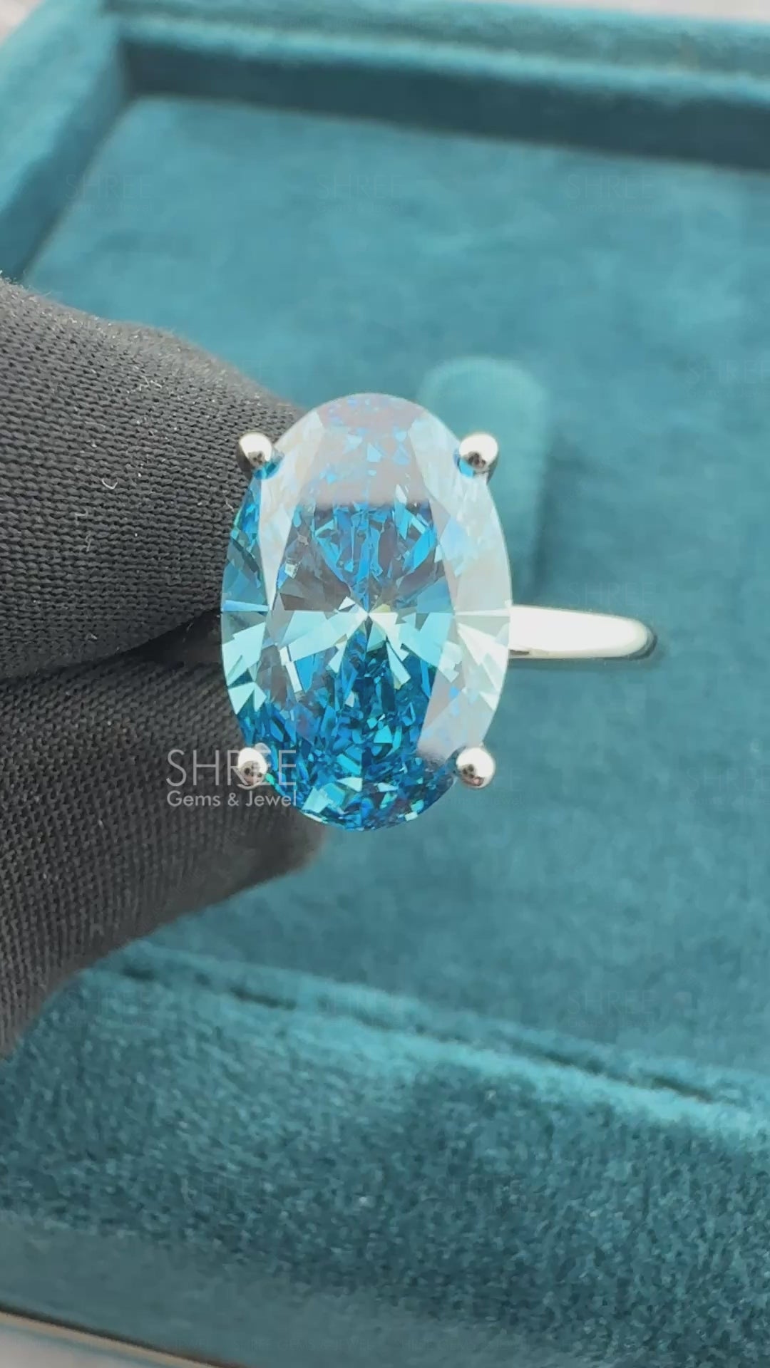 VIdeo of 3 Carat Fancy Blue Oval Hidden Halo Engagement Ring