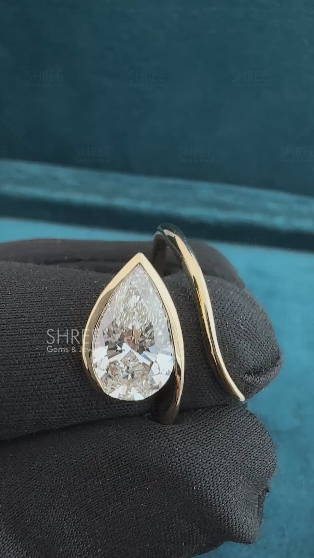 Video of 2 Ct Pear Shaped Solitaire Diamond Bypass Ring