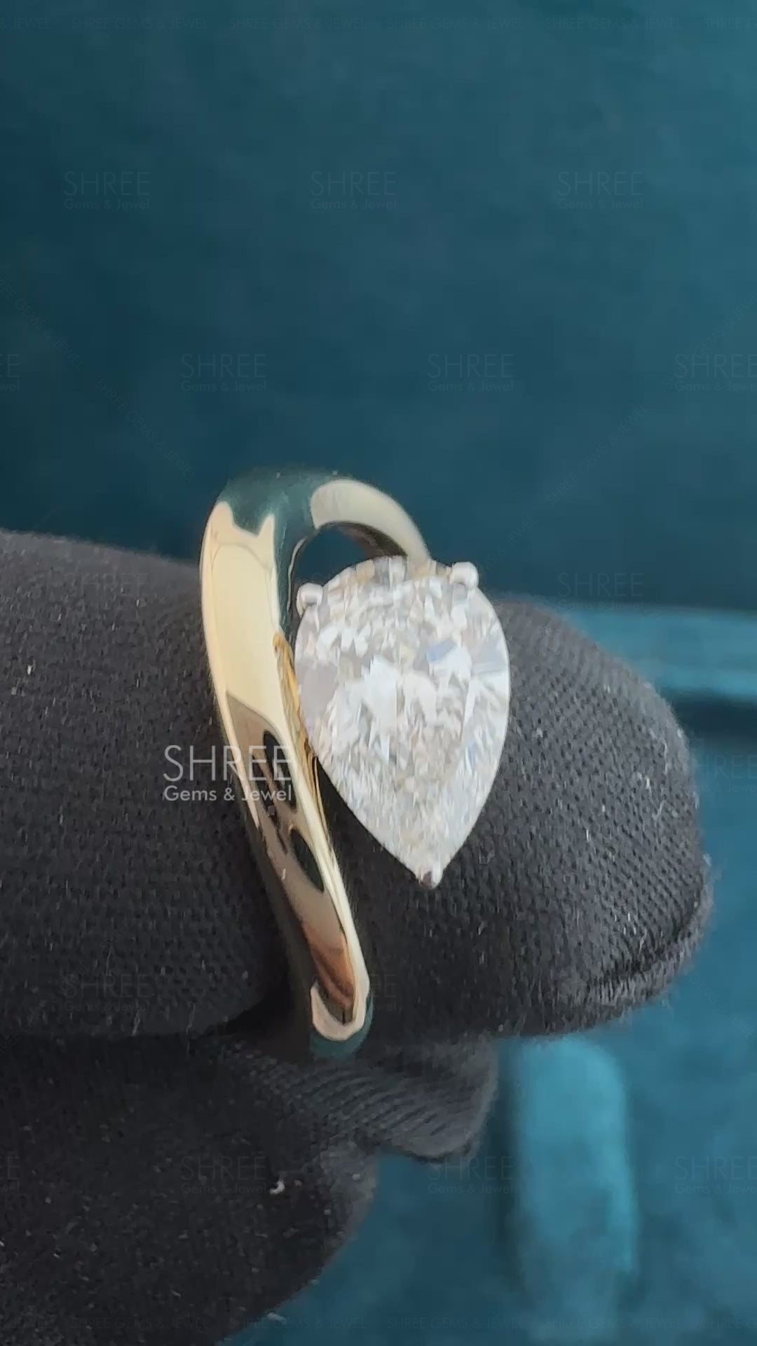 video of 1 ct pear shape diamond engagement ring