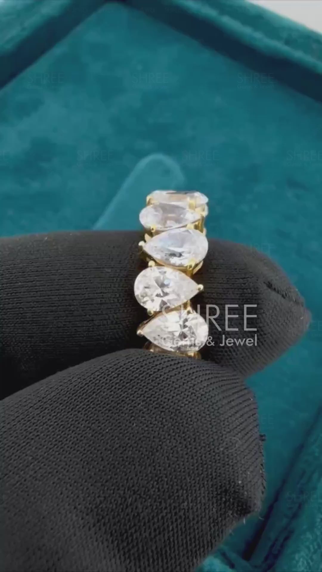 Video of 3 Ct Pear Cut Women's Lab Grown Diamond Wedding Band